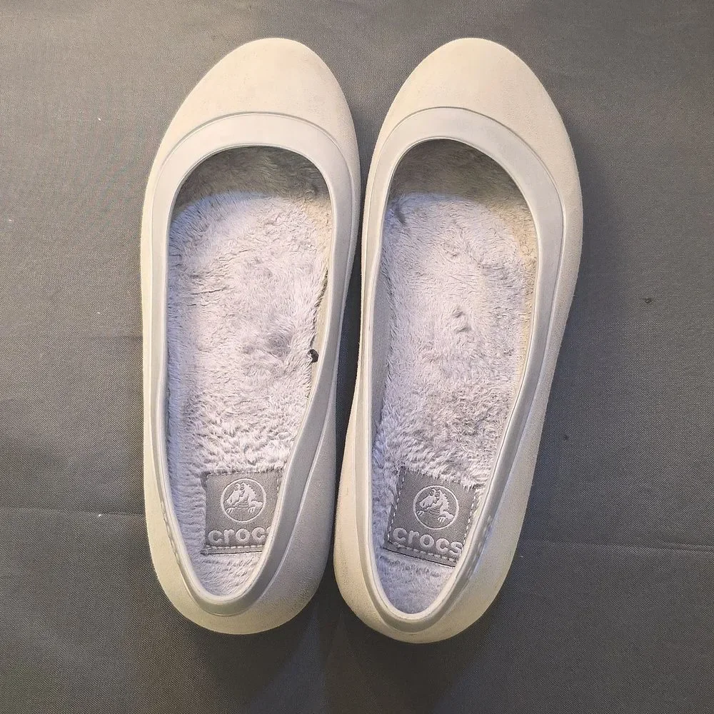 CROCS flats featuring